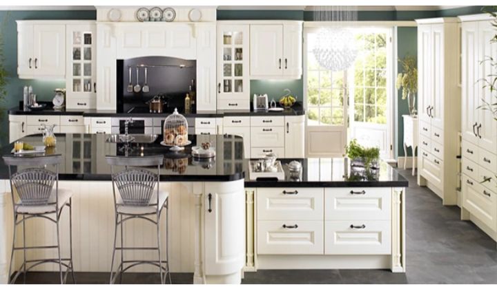 White Classic Kitchen Cabinets by RenoSphere
